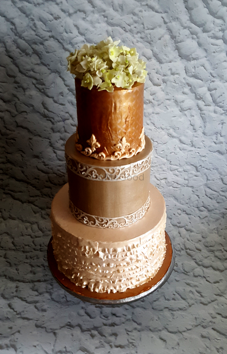 Photo of Gold and White 3 Tiered Wedding Cake