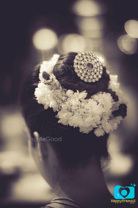 Bridal Bun with Flowers and Hair Ornament