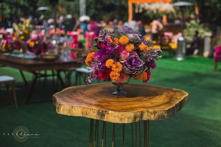 rustic side table with pretty floral arrangement 