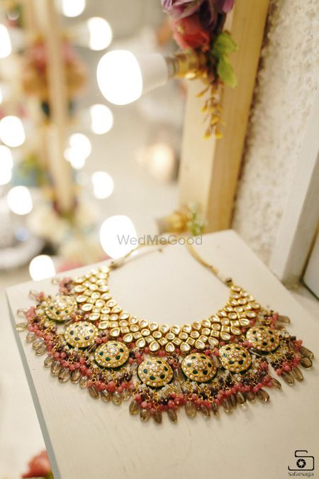 bridal necklace photography with pink beads