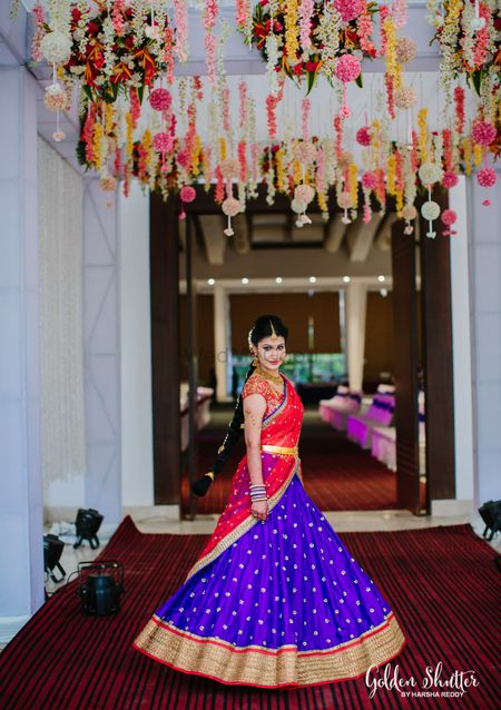 Photo of Blue Lehenga with Gold Border and Red Dupatta