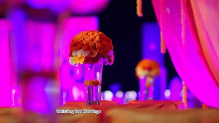 Photo of Centrepieces with Roses in Glasses