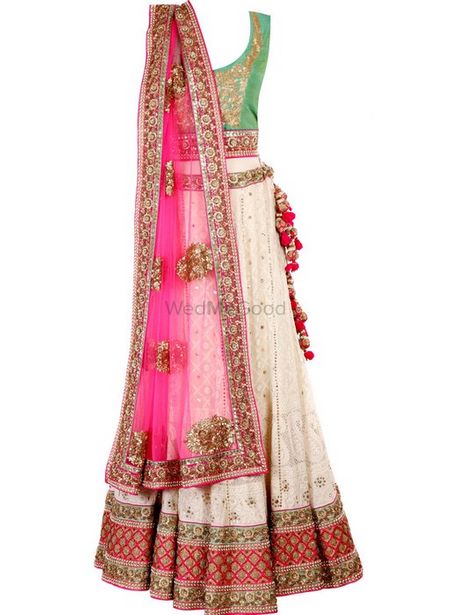 mint green blouse with white lehenga and pink dupatta