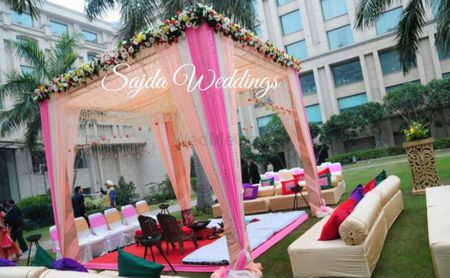 peach pink and white mandap outdoor
