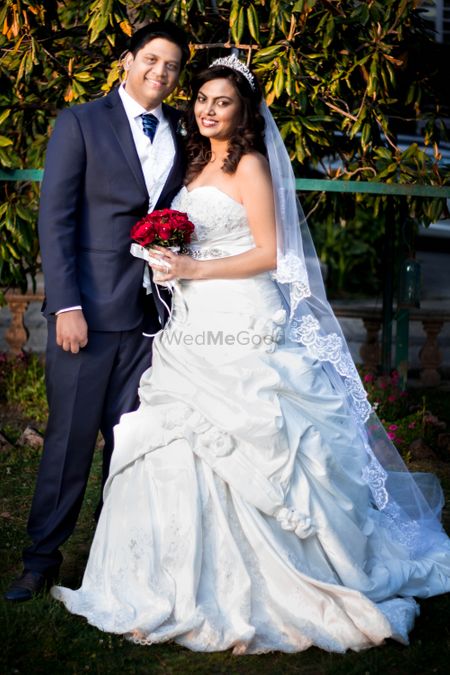Photo of White Christian Wedding Gown with Tiara and Veil