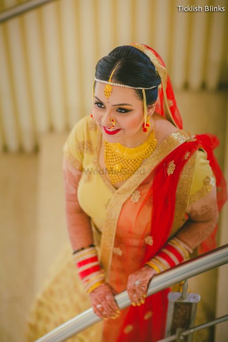 North Eastern Bride in Red and Beige Outfit