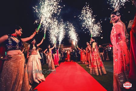 Guests Holding Light Pyro for Bride and Groom Entrance