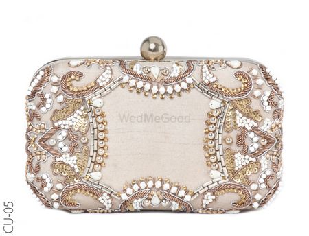 Photo of gold and silver glamorous bridal clutch for cocktail
