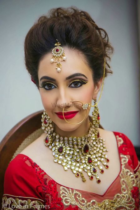 Photo of Red and Gold Bridal Jewellery with Statement Necklace