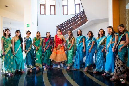 Photo of Bride with Matching Bridesmaids in Blue Sarees