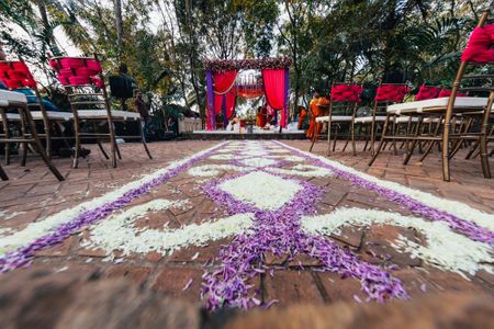 Photo of Purple and red mandap decor