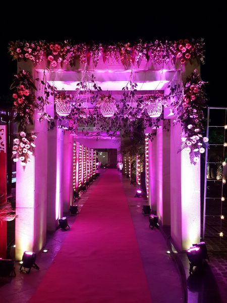 floral archway purple lighting