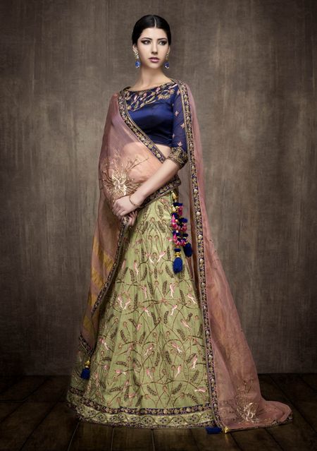 Green Lehenga with Purple Blouse and Pink Dupatta