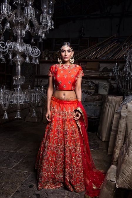 Red bridal lehenga with floral embroidery