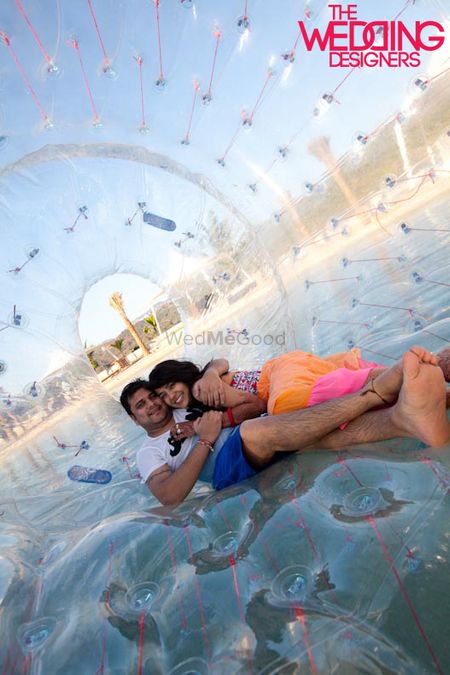 Photo of pool party idea with zorbing ball