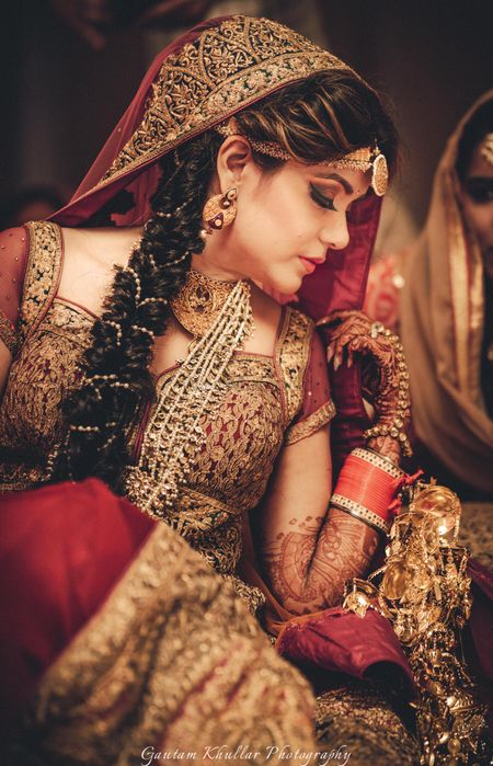 Bride wearing deep maroon