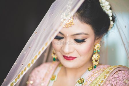Gold and green bridal jewellery