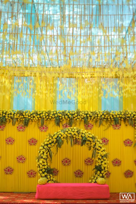 Photo of Floral wreath seating decor for Mehendi.