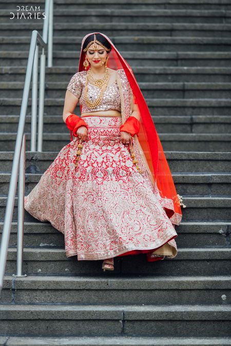 Photo of Red and pink bridal leheng