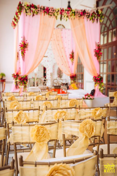 Light pink and yellow mandap and seating
