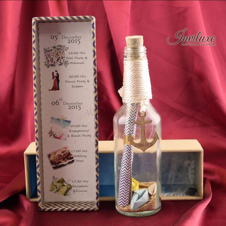 Nautical theme invite with message in a bottle