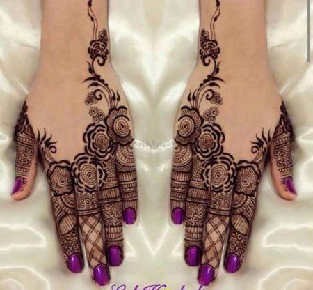 Photo of Modern mehendi design with blank spaces