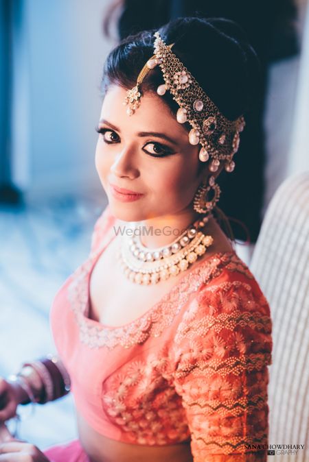 Statement side bridal mathapatti with pearls