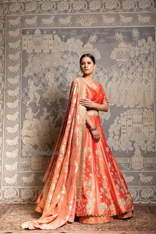 Orange lehenga on sale design