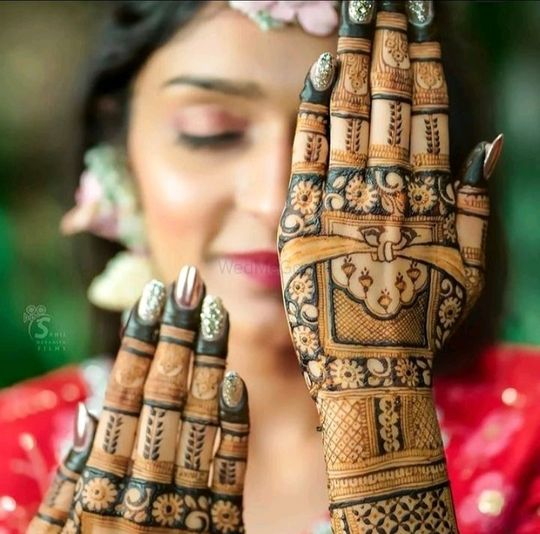 Top 20+ Full Hand Mehndi Design to Pick This Wedding Season- WeddingWire