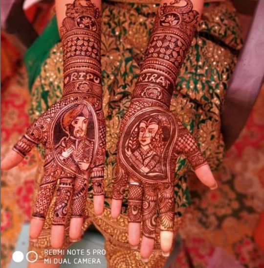 Mehndi artist making mehndi bridal hand In India, mehndi design Stock Photo  - Alamy