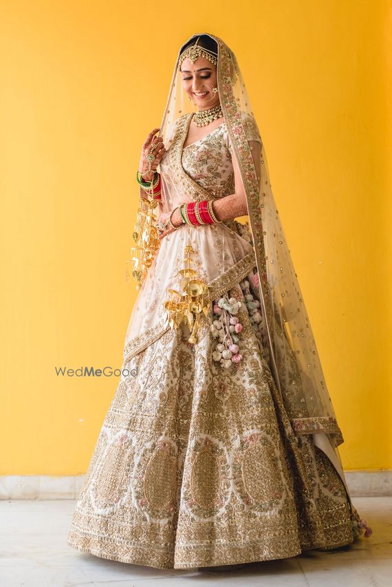 white and gold wedding lehenga