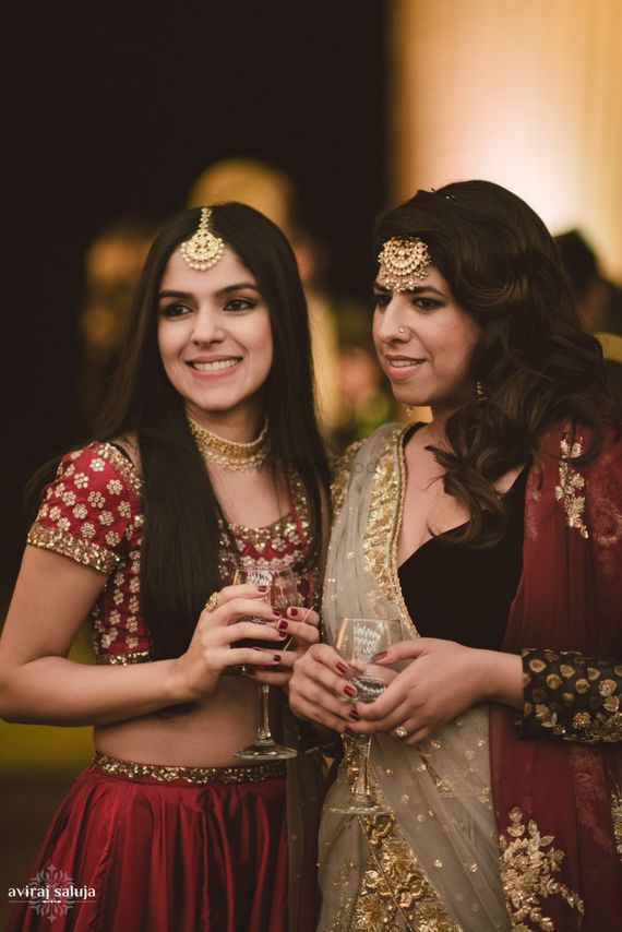 Photo Of Wedding Guests Attending Indian Wedding