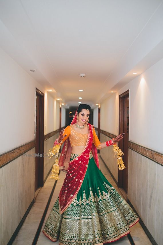 red and yellow bridal lehenga