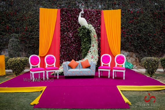 Photo Of Mehendi Stage Backdrop With Peacock Prop