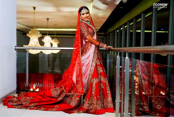 white bridal lehenga with red dupatta