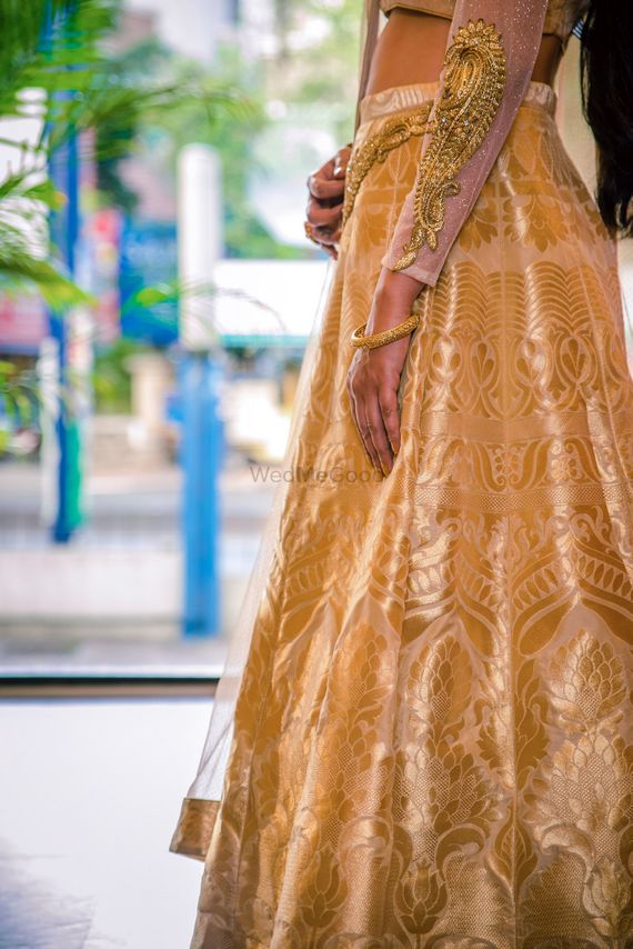 Photo Of Gold Lehenga With Zari Work And Embroidery