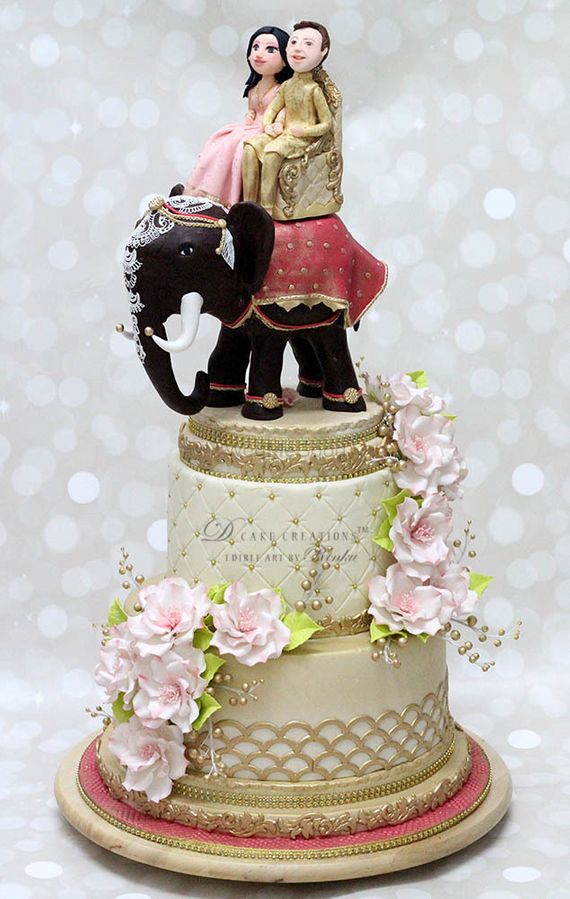 Photo Of Gold Destination Wedding Cake Topper With Couple On Elephant