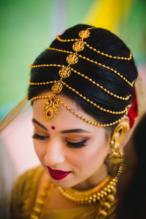 Photo Of South Indian Bridal Hair Ornaments With Multiple Strings