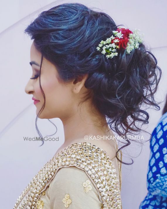 Photo Of Sister Of The Bride Messy Bun With Flowers