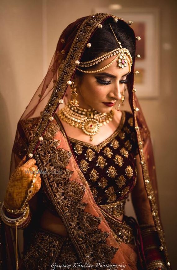 Photo Of Wine And Gold Embellished Bridal Lehenga wine and gold embellished bridal lehenga
