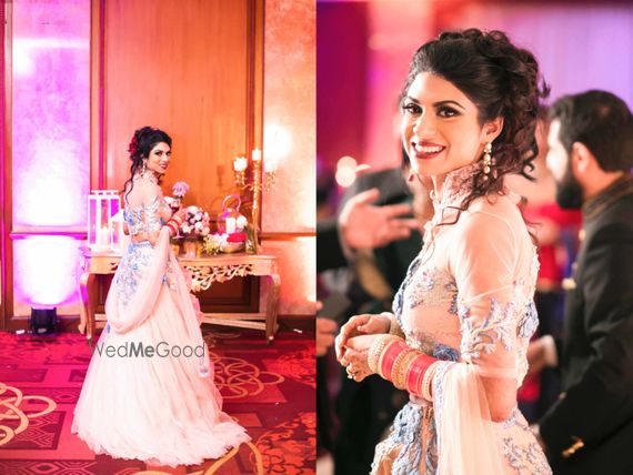 Photo Of Sangeet Lehenga With Messy Bun Hairstyle
