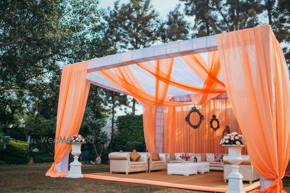 Photo Of Orange And White Mandap Decor With Drapes For Destination