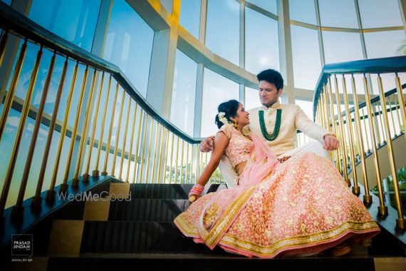 Photo Of Romantic Couple Pose With Bride Sitting On Grooms Lap