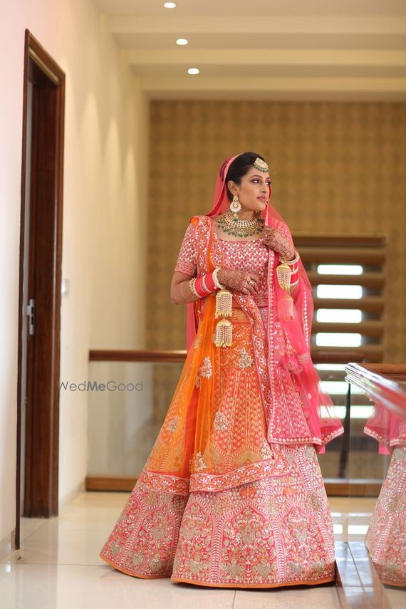 orange and pink bridal lehenga
