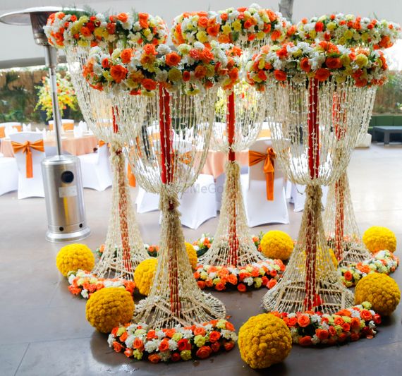 Photo Of Floral Arrangements At Indian Wedding