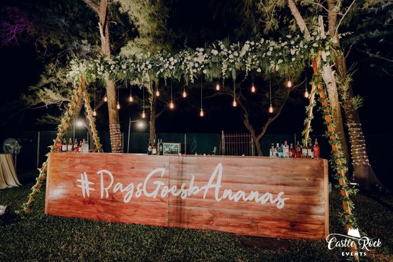 Photo of Bar setup with the wedding hashtag
