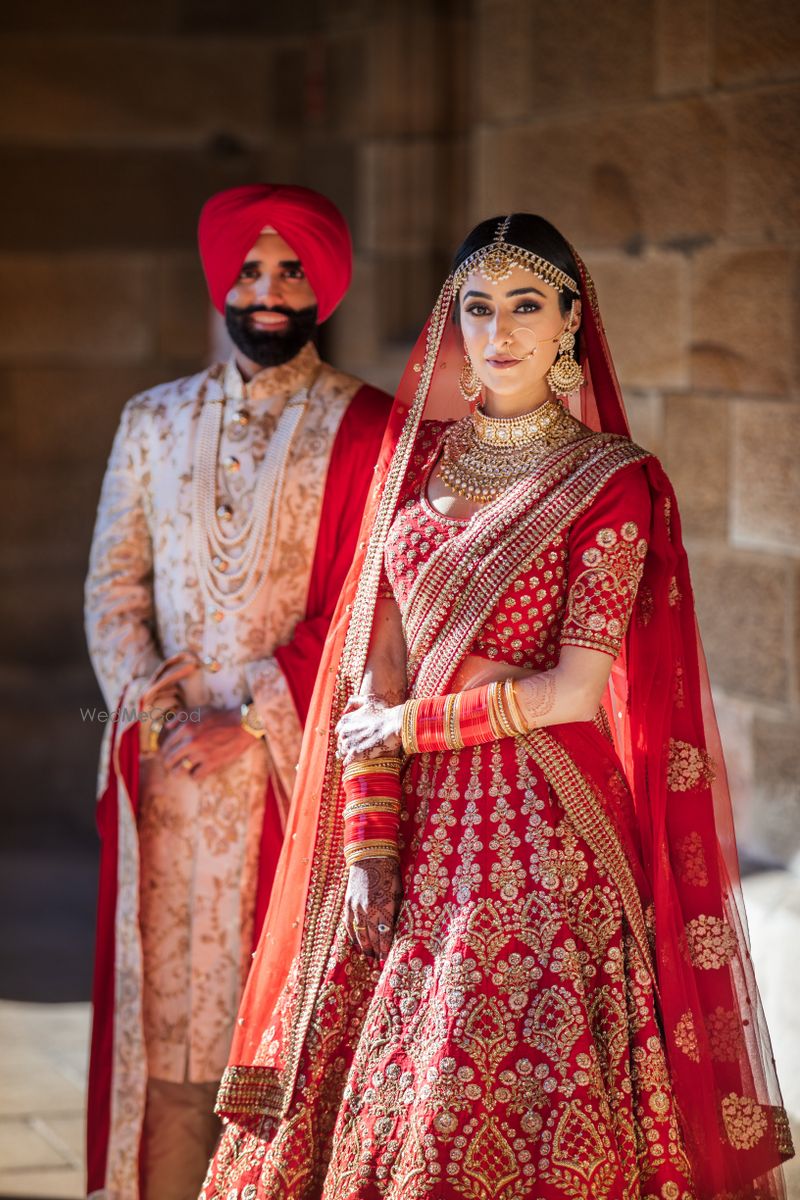 Photo Of A Color Coordinated Couple Posing On Their Wedding Day