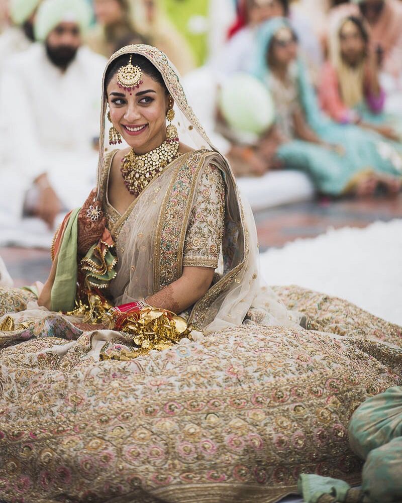 Sabyasachi Bride Wore A Unique Multi-Coloured Lehenga With Pink 'Chooda'  For Her Wedding Day