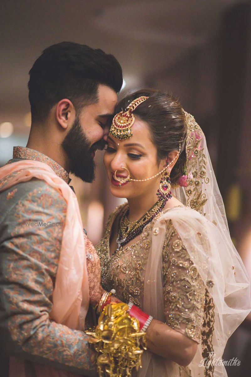 Photo of Romantic couple portrait post wedding