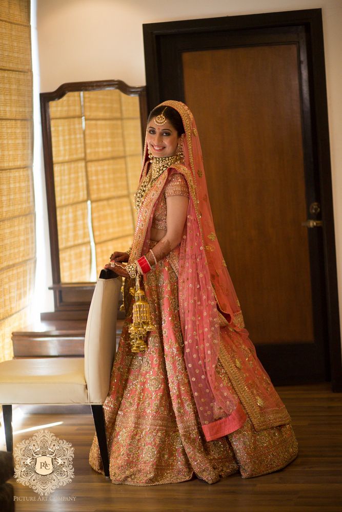 Sabyasachi hotsell peach lehenga